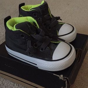 Dark gray lime green hightop converse